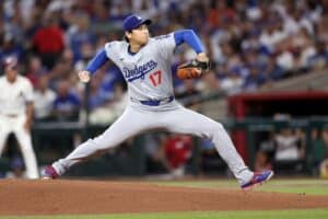 Shohei Ohtani #17 of the Los Angeles Dodgers pitches against the Arizona Diamondbacks