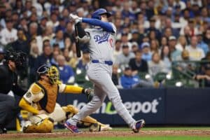 Shohei Ohtani #17 of the Los Angeles Dodgers grounds out during the game against the Milwaukee Brewers.