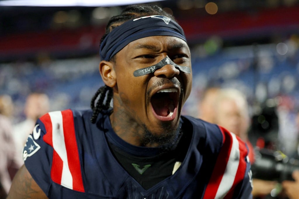 Stefon Diggs #8 of the New England Patriots celebrates after defeating the Buffalo Bills.