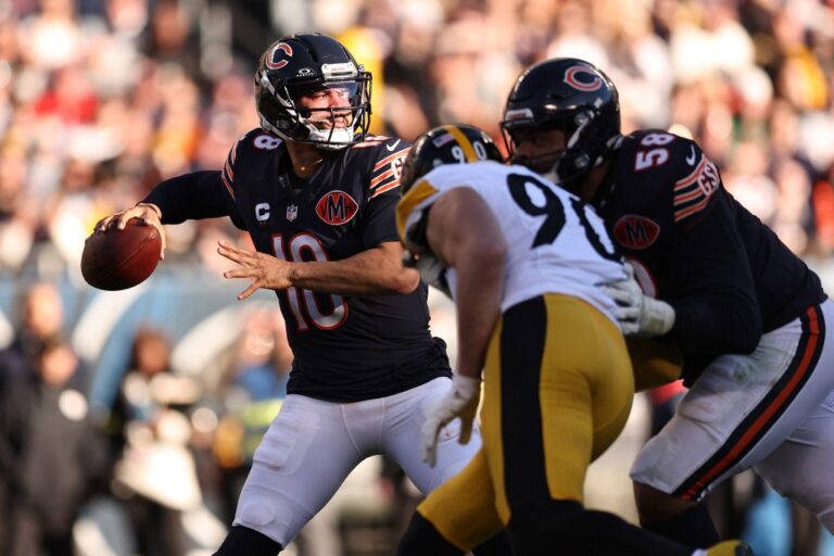 Pittsburgh Steelers v Chicago Bears - Oddstrader - Oddstrader The cover for this Thursday night football picks article shows Caleb Williams #18 of the Chicago Bears throwing a pass against the Pittsburgh Steelers.