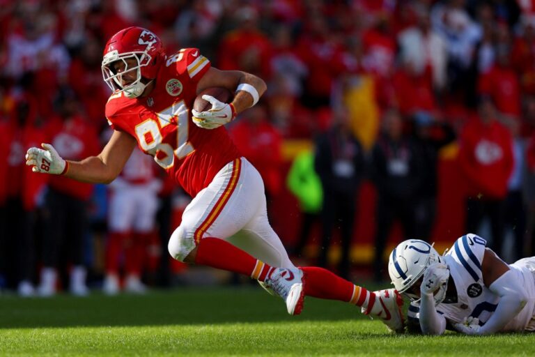 Indianapolis Colts v Kansas City Chiefs - Oddstrader - Oddstrader The cover for this best bets for Thanksgiving football article shows Travis Kelce #87 of the Kansas City Chiefs being tackled by Cam Bynum #0 of the Indianapolis Colts.