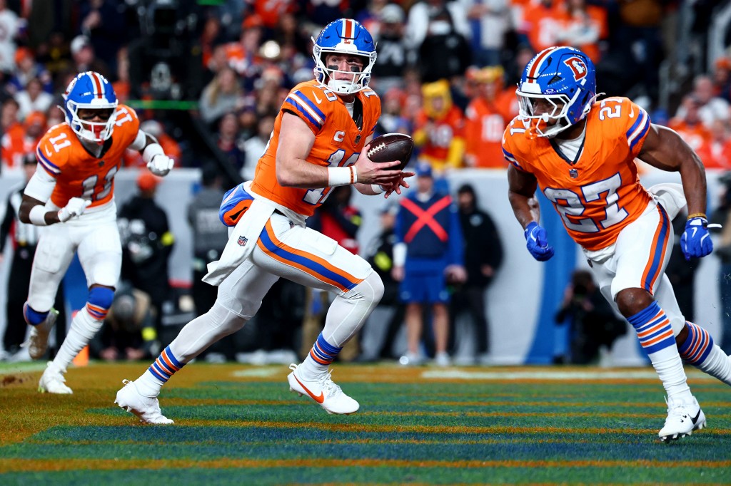 Bo Nix of the Denver Broncos, featured in our Sunday night football picks, scrambles against the Las Vegas Raiders.