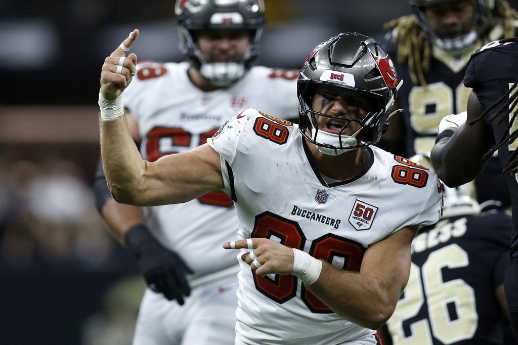 Cade Otton #88 of the Tampa Bay Buccaneers, a team with great value at the NFL Odds Week 10 boards, celebrates a run against the New Orleans Saints.