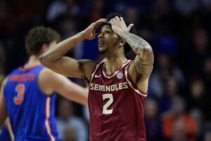 Florida State v Florida - Oddstrader Cam Miles #2 of the Florida State Seminoles reacts during the second half of a game against the Florida Gators.