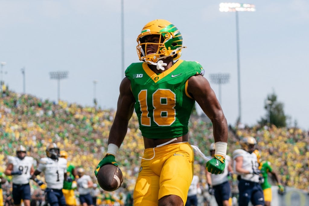 Kenyon Sadiq of the Oregon Ducks, our pick for College football player props week 11, reacts after scoring a touchdown against the Montana State Bobcats.