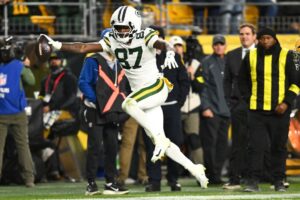 Romeo Doubs #87 of the Green Bay Packers catches a pass for a first down during the fourth quarter against the Pittsburgh Steelers.