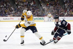 The cover for this NHL picks today article shows Ryan O'Reilly #90 of the Nashville Predators advancing the puck against Nathan Mackinnon #29 of the Colorado Avalanche.