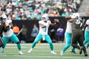 Tua Tagovailoa #1 of the Miami Dolphins passing the ball against the New York Jets.