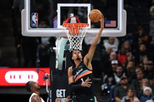 The cover for this NBA player props today article shows Victor Wembanyama #1 of the San Antonio Spurs in action during the game against the Cleveland Cavaliers.