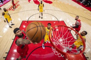 The cover for this NBA player props today article shows Brandon Ingram #3 of the Toronto Raptors goes to the basket against the Los Angeles Lakers.