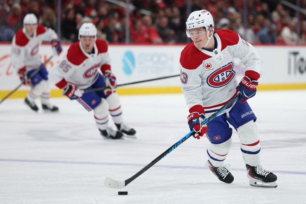The cover for this NHL picks today article shows Cole Caufield #13 of the Montreal Canadiens skating with the puck against the Washington Capitals.