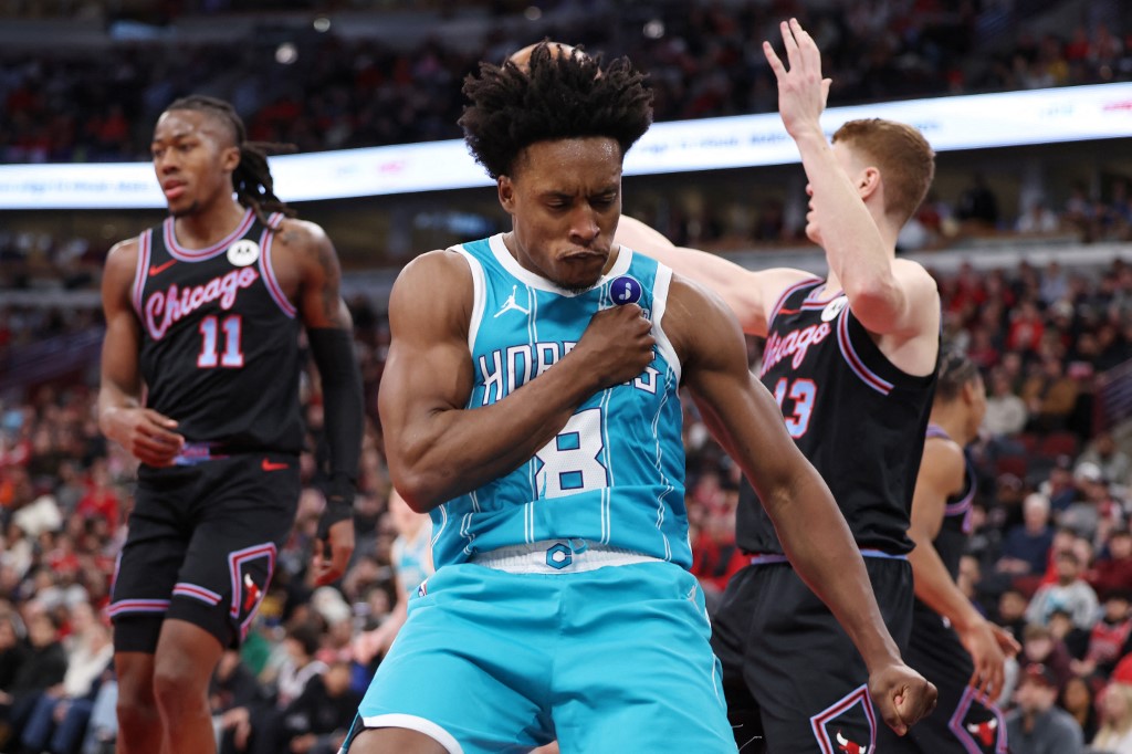 Collin Sexton #8 of the Charlotte Hornets celebrates scoring during the second half against the Chicago Bulls.