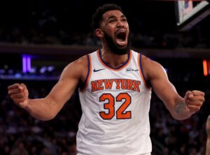 The cover for this NBA player props today article shows Karl-Anthony Towns #32 of the New York Knicks reacting in the second half against the LA Clippers.
