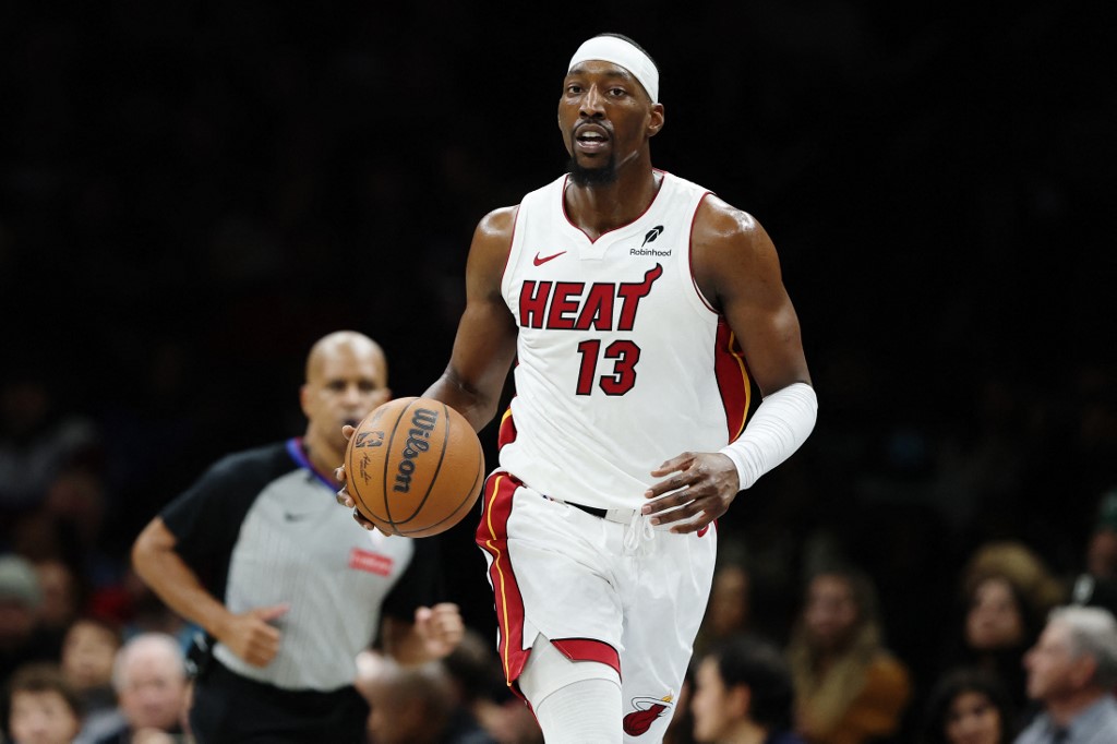 Bam Adebayo #13 of the Miami Heat dribbles during the second half against the Brooklyn Nets.
