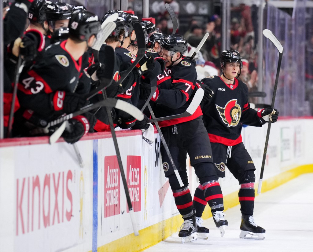 Brady Tkachuk #7 of the Ottawa Senators celebrates his third period empty-net goal against the Colorado Avalanche.