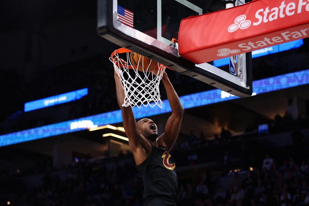 Evan Mobley #4 of the Cleveland Cavaliers dunks during the second half against the Minnesota Timberwolves.