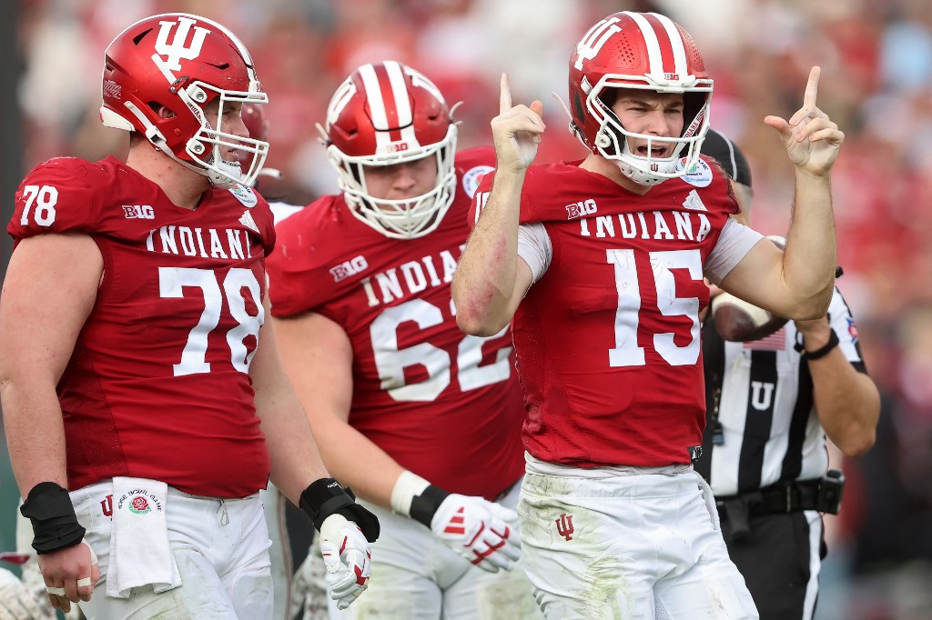 Fernando Mendoza #15 of the Indiana Hoosiers reacts after running for a first down in the third quarter against the Alabama Crimson Tide.