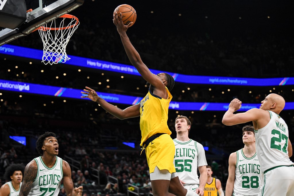Jarace Walker #5 of the Indiana Pacers lays up the ball against the Boston Celtics.