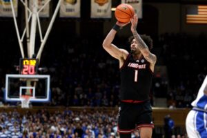 J'Vonne Hadley #1 of the Louisville Cardinals puts up a shot in the first half against the Duke Blue Devils.