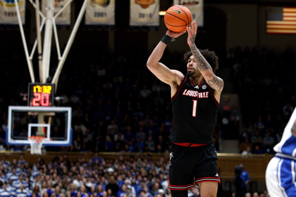 J'Vonne Hadley #1 of the Louisville Cardinals puts up a shot in the first half against the Duke Blue Devils.