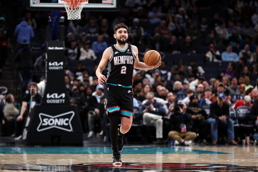 Ty Jerome #2 of the Memphis Grizzlies brings the ball up court during the second half against the Minnesota TImberwolves.