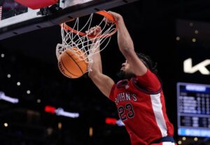 Bryce Hopkins #23 of the St. John's Red Storm dunks during the second half of the game against the Kentucky Wildcats.