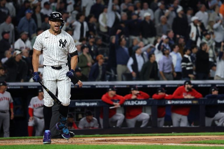 Giancarlo Stanton #27 of the New York Yankees reacts during game three of the American League Wild Card Series against the Boston Red Sox