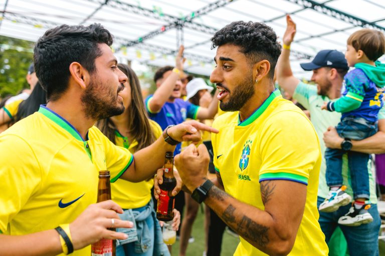 Photo by Juliano Ferreira: https://www.pexels.com/photo/people-in-yellow-t-shirts-celebrating-a-sports-win-14565750/